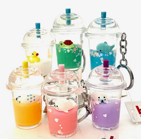 Sea Life Drink Keychain featuring assorted cute animal figures in colorful drink cups keychains sold individually.