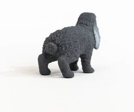 Lop Eared Rabbit figurine from Schleich Farm World showing the floppy-eared bunny facing away on a white background.