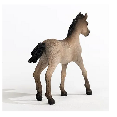 Criollo Definitivo Foal hand-painted figurine of a foal with black mane and tail standing on white background.