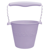 Scrunch Bucket Purple made of flexible silicone with a solid handle and matching rope for versatile outdoor use.