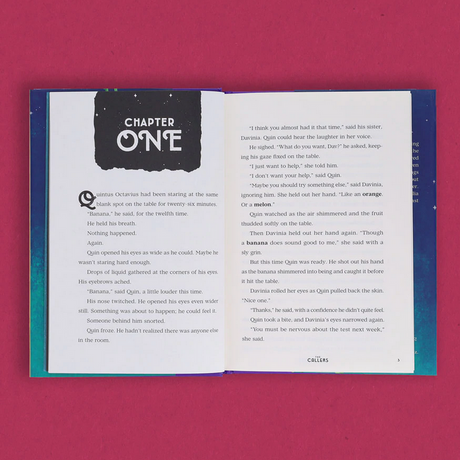 Open book showing Chapter One of The Callers middle grade novel with text about Quin and his sister.