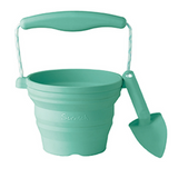 Scrunch Seedling Pot Mint Green with soft silicone, collapsible design, rope handle, and included trowel for gardening and play.