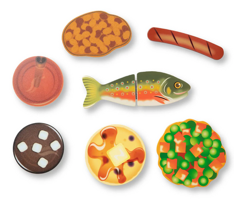 Camp Stove Play Set wooden play food pieces including fish, pancake, sausage, vegetables, and dessert items.