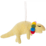 Yellow Dino Felt Ornament with colorful pom pom necklace, soft felt texture, and hanging string for holiday decoration.