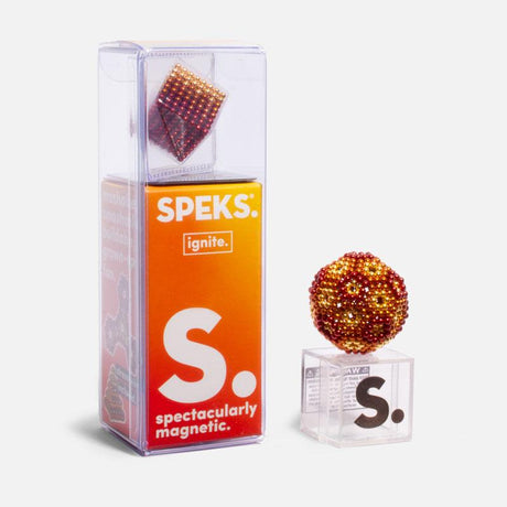 Speks. Gradient. Ignite. magnetic balls in orange and red hues with clear packaging and display stand.