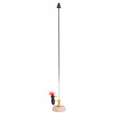 Woodpecker toy with feathers on a tall stand, designed for desk entertainment and fun tapping action.