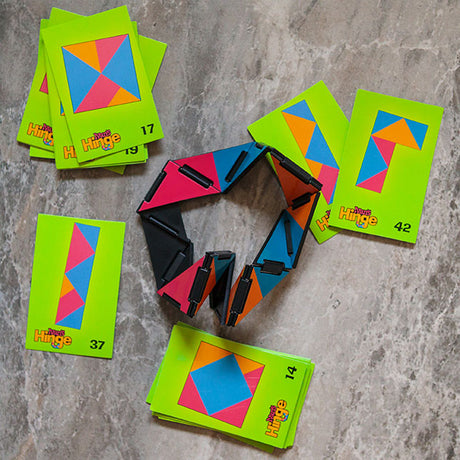 Ivan's Hinge articulating toy with colorful hinged pieces and pattern cards for creative, fidgety fun and challenge.