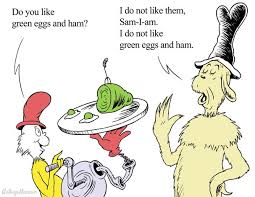 Green Eggs and Ham book illustration featuring Sam-I-am offering green eggs and ham on a plate.
