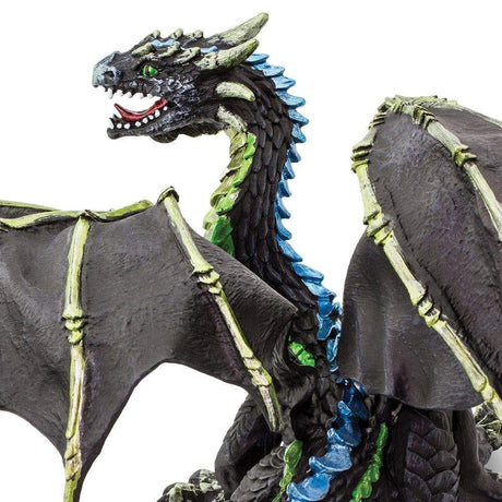 Fog Dragon figure with bony wings, black skin, and blue-green accents, appearing fierce and mysterious in detail.