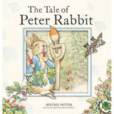 The Tale of Peter Rabbit board book cover with Peter Rabbit holding vegetables in a garden scene.