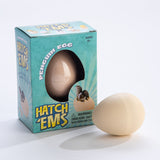 Hatch Em Penguin toy with plastic egg that cracks open in water revealing a growing penguin figure for ages 6+