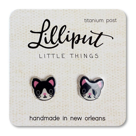 Tuxedo Kitty Earrings featuring detailed black and white cat faces with titanium posts, handmade in New Orleans.