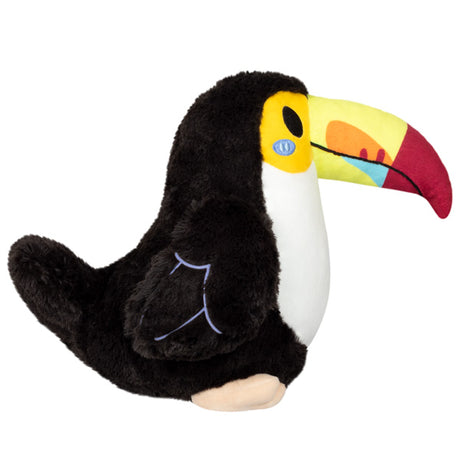 Toucan Mini plush toy with colorful beak, soft black and white polyester fiber, perfect cuddly pet for all ages.