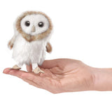 Barn Owl Finger Puppet perched on a hand, featuring soft fur and big black eyes, perfect for playful storytelling.
