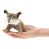 Bobcat Finger Puppet shown on hand, realistic wild cat design with green eyes and soft fur, perfect for kids age 3 and up.