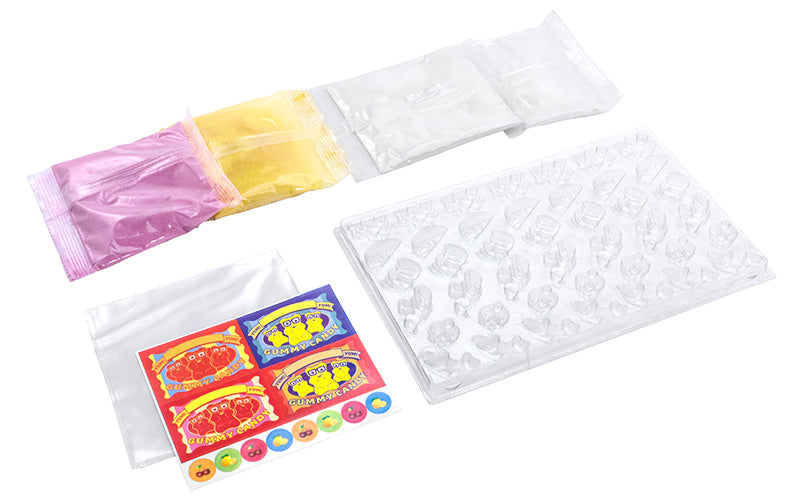 Gummy Candy Lab kit with natural gelatin powders, clear candy mold, and colorful stickers for making gummy shapes.
