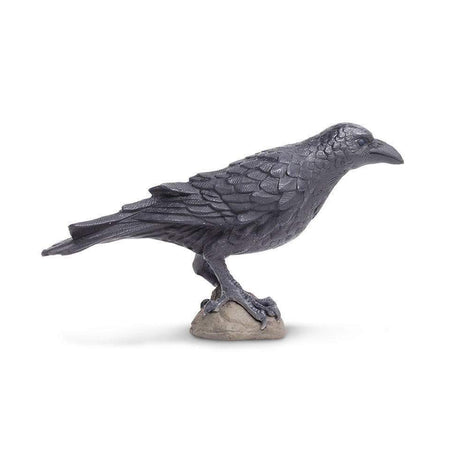 Raven toy figurine in black with detailed feathers, standing 3 inches long and 2 inches tall on a small base.