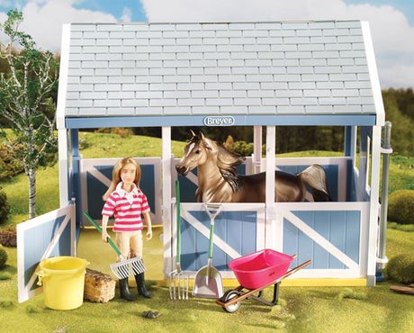 Stable Cleaning Accessories with wheelbarrow, muck bucket, shovel, rake, pitchfork, hay bale, and horse figure in 1:12 scale.