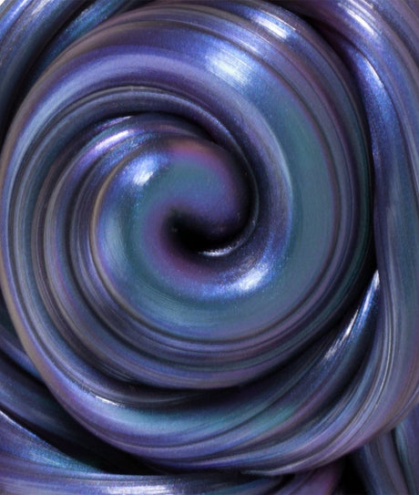 Super Illusions Super Scarab Thinking Putty showing swirled purple with blue and teal color-shifting texture close-up.