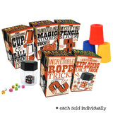 Classic Magic Trick showing assorted classic magic trick boxes and colorful cups for kids ages 5 and up.