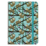 Sloths Journal with playful sloth pattern on blue cover and blue elastic closure for secure writing.