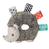Taggies Heather Hedgehog Rattle plush toy with colorful ribbons and soft gray fabric, perfect for little hands to shake.