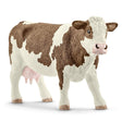 Simmental Cow figurine with white head, legs, belly, and reddish brown patches, realistic detailed model.