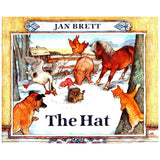 The Hat board book cover shows animals gathered around a red woolen stocking in a snowy farm scene.