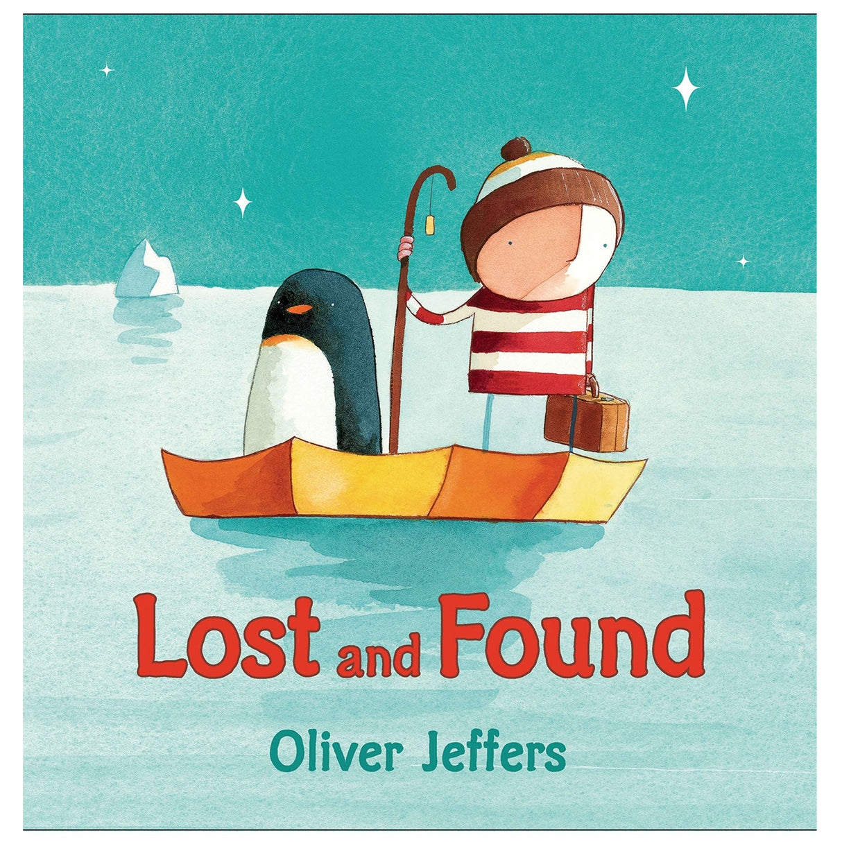 Lost and Found cover showing a boy and a penguin on a boat in icy waters under a starry sky.