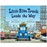 Cover of Little Blue Truck Leads the Way showing a cheerful blue truck in city traffic with tall buildings.