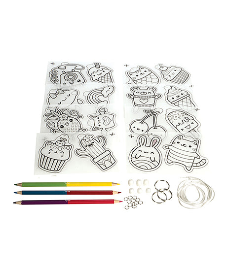 Shrinkies | Ultimate Collection showing plastic charms, color pencils, key rings, and jewelry cords for creative crafts.